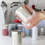 person-disinfecting-surfaces